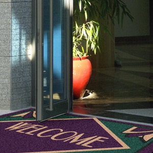 Welcome mat with logo image.